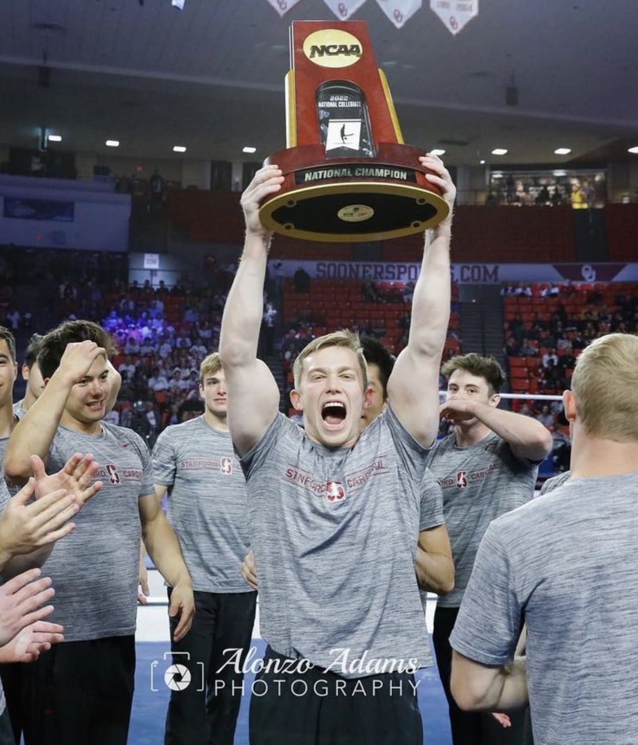 Ian Gunther lifting the NCAA championship trophy